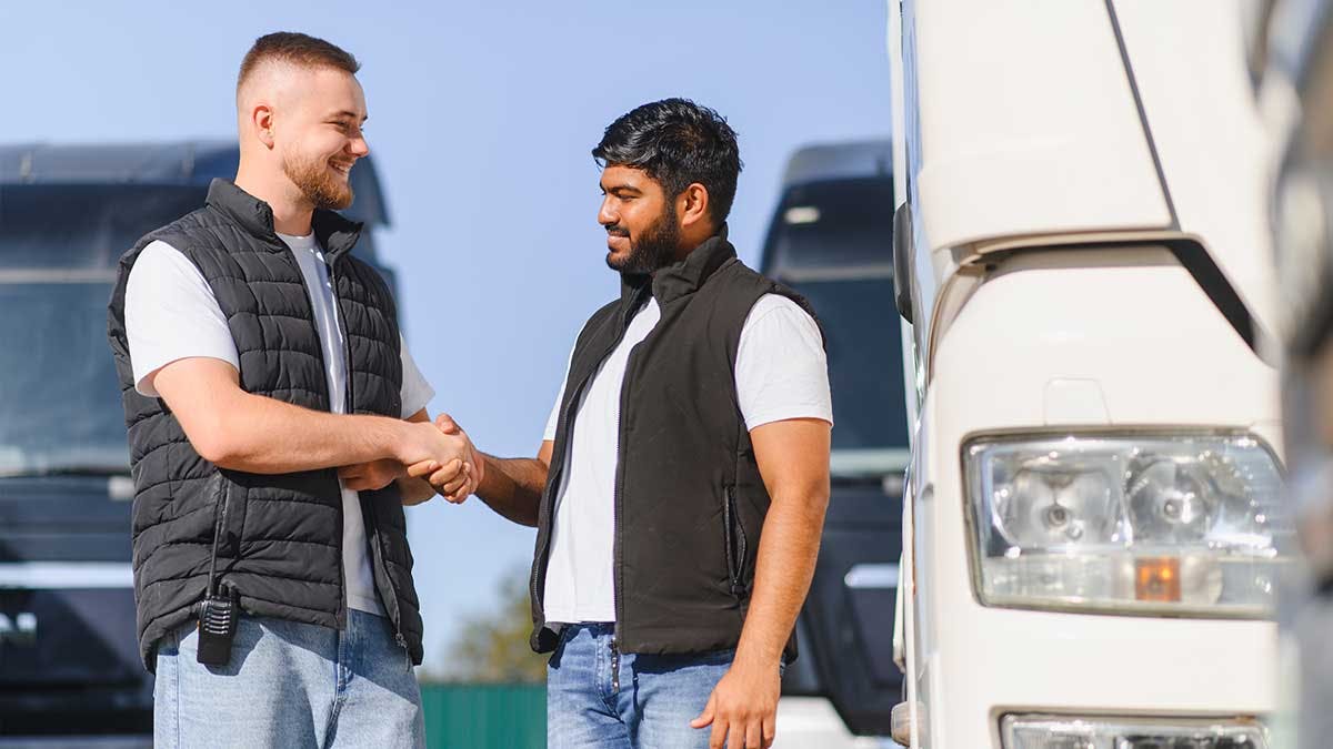 Carriers shaking hands