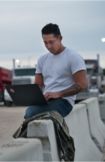 carrier using a laptop