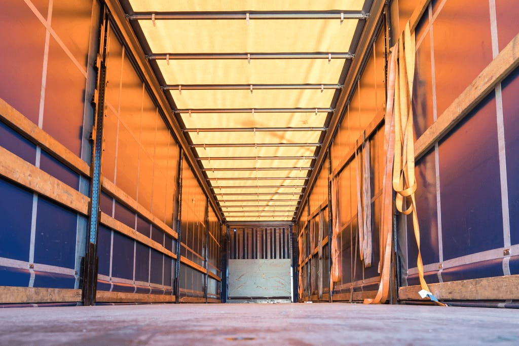 Empty truck trailer ready for freight assignment