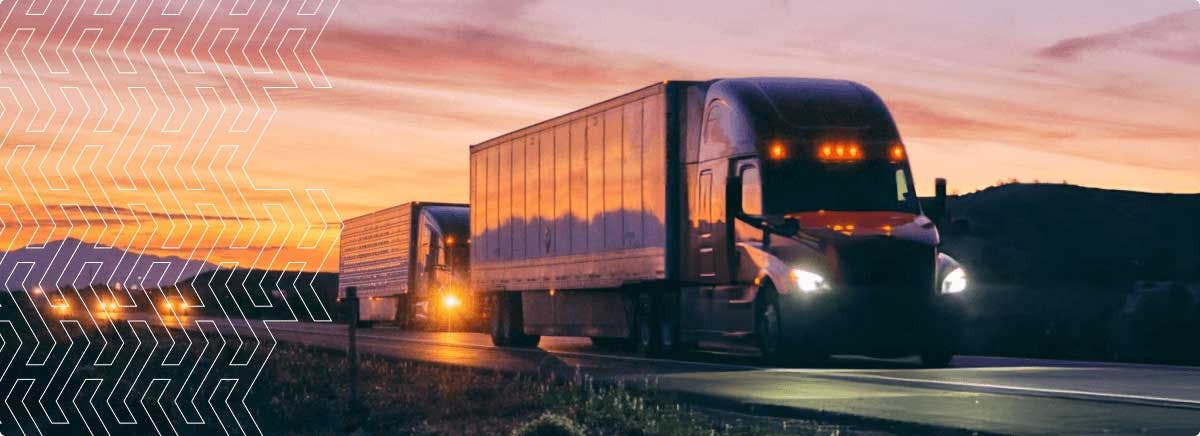 Semi-truck on highway at dusk