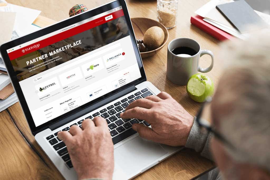 Person using marketplace on their laptop.